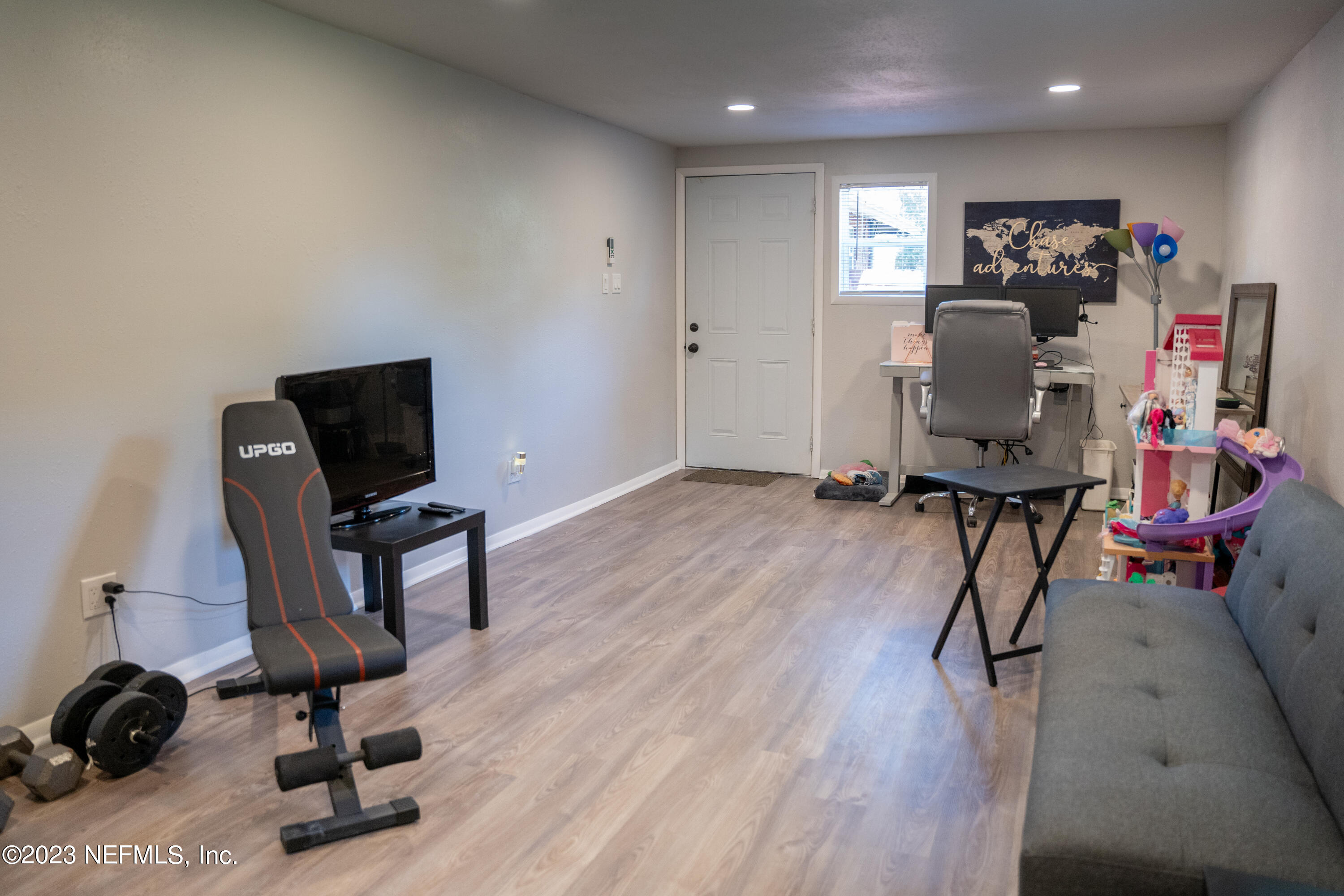 9008 Old Kings Road Jacksonville, FL 32219 - Photo 21 of 22 a view of a workspace with furniture and a window