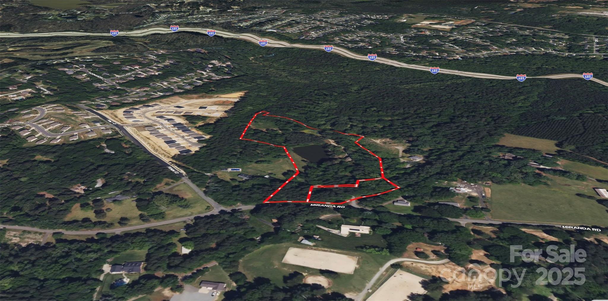 2835-2839 Miranda Road Charlotte, NC 28216 - Photo 2 of 9 an aerial view of residential houses with outdoor space