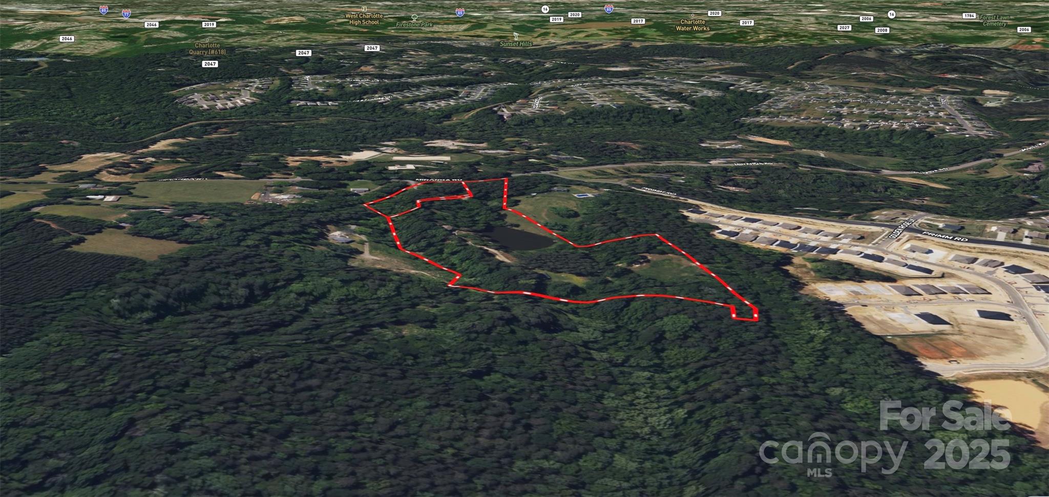 2835-2839 Miranda Road Charlotte, NC 28216 - Photo 3 of 9 an aerial view of residential houses with outdoor space