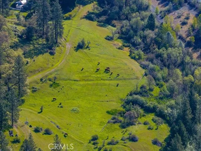 a large body of water with a building in the background