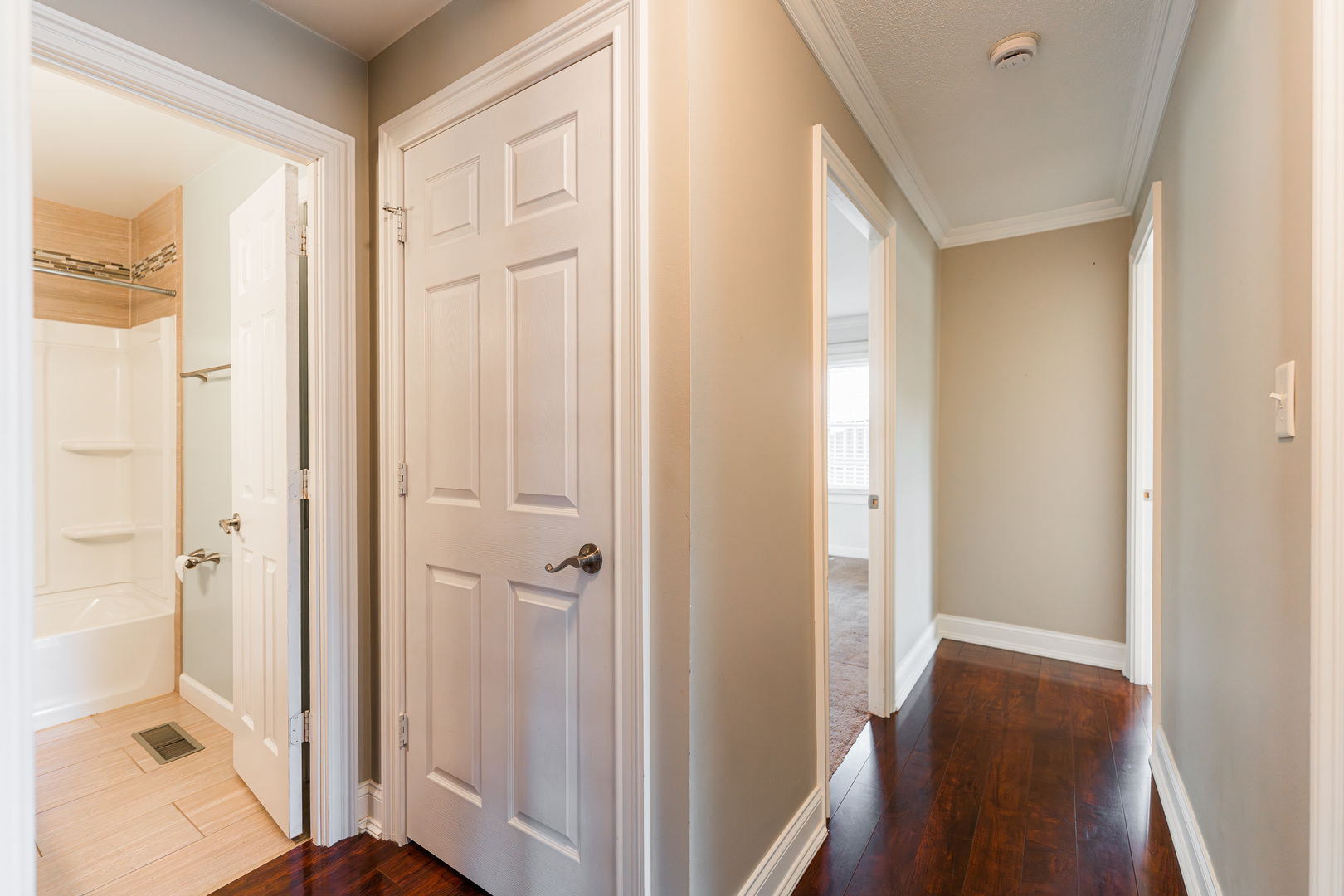 1614 East Dresser Road DeKalb, IL 60115 - Photo 11 of 26 a view of a bathroom from a hallway