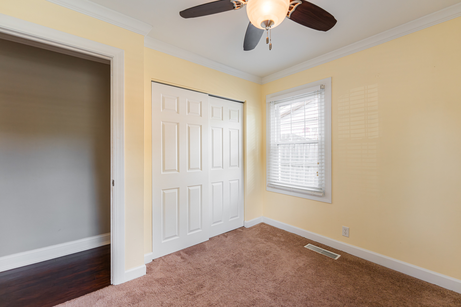 1614 East Dresser Road DeKalb, IL 60115 - Photo 15 of 26 a view of an empty room with a window