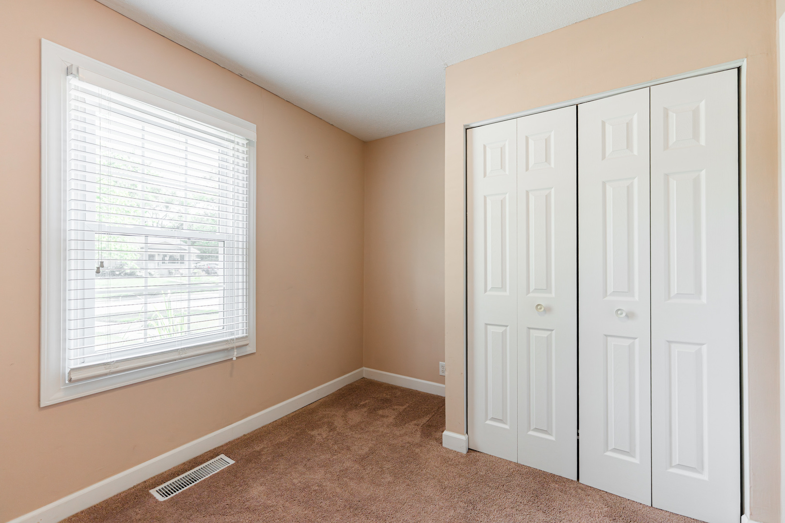 1614 East Dresser Road DeKalb, IL 60115 - Photo 17 of 26 a view of a livingroom with a window