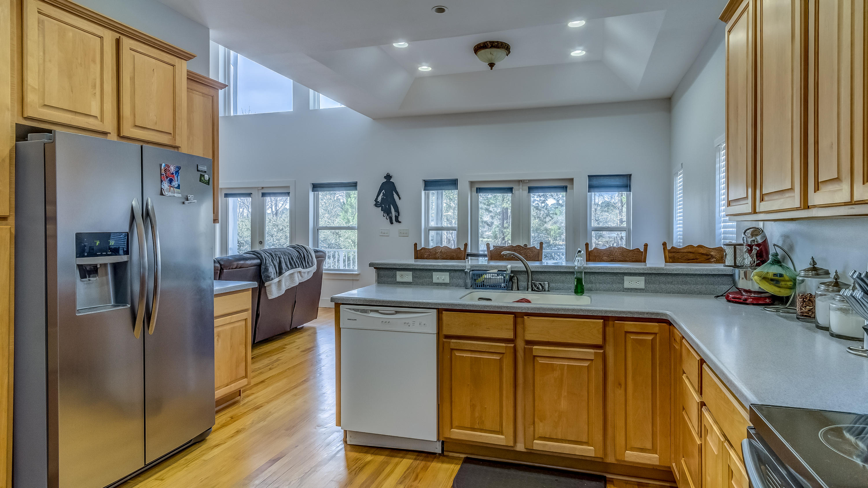 556 Mallet Bayou Road Freeport, FL 32439 - Photo 13 of 29 a kitchen with sink refrigerator and cabinets