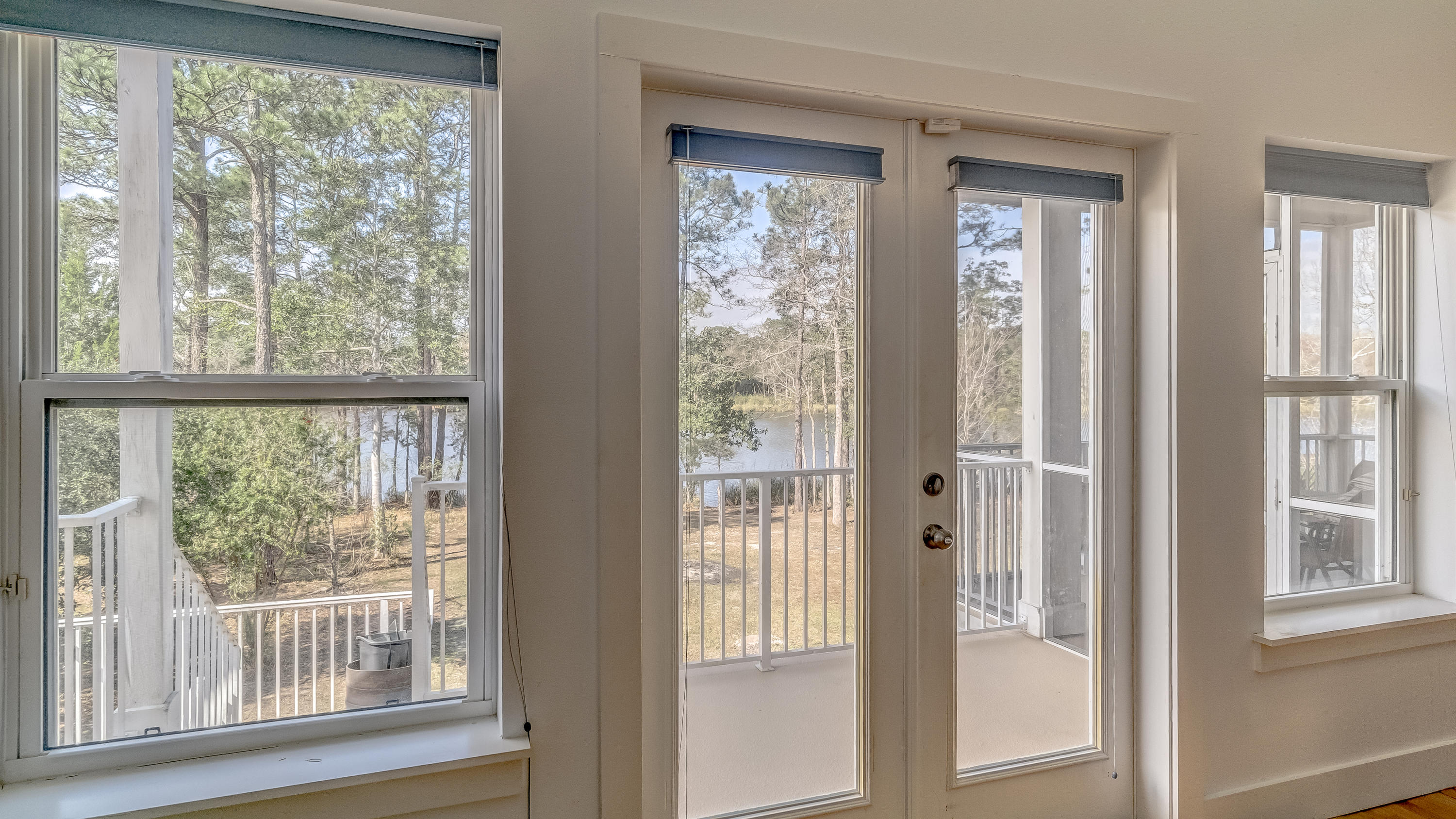 556 Mallet Bayou Road Freeport, FL 32439 - Photo 19 of 29 a view of a wooden door and front view of a house