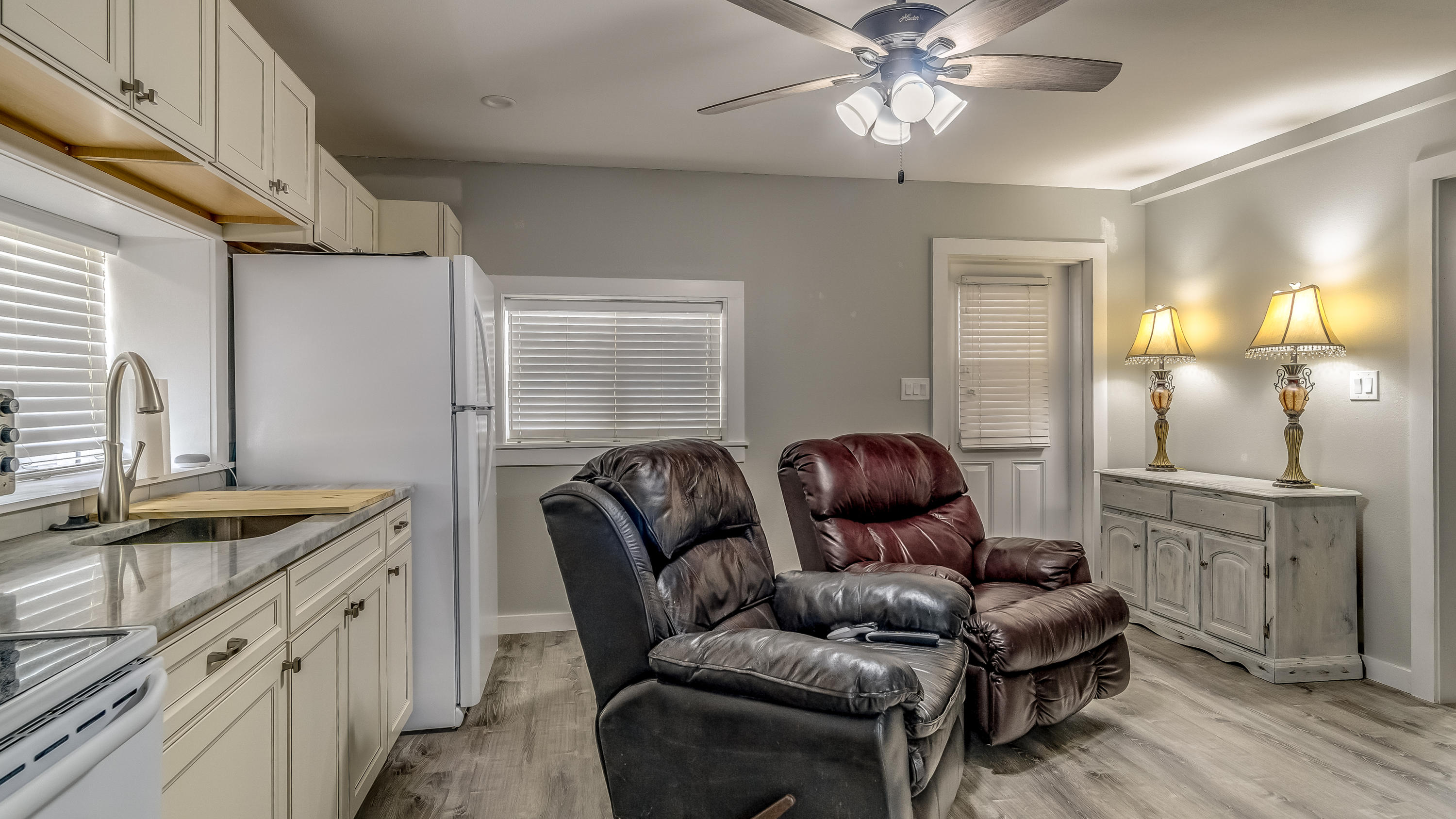 556 Mallet Bayou Road Freeport, FL 32439 - Photo 23 of 29 a living room with furniture and a chandelier