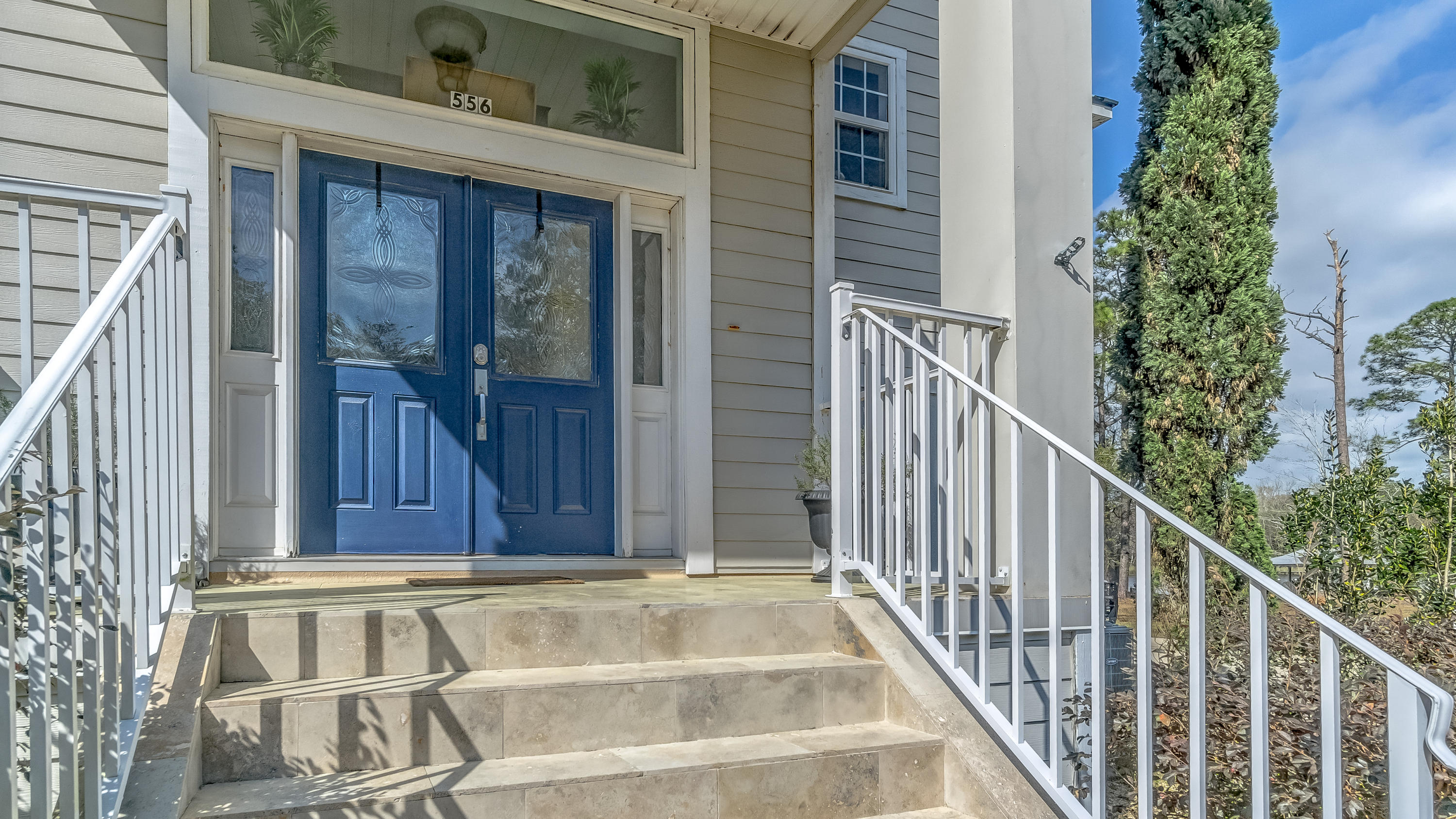 556 Mallet Bayou Road Freeport, FL 32439 - Photo 9 of 29 a view of a house with a balcony