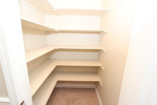 1762 North Hope Avenue Reedley, CA 93654 - Photo 19 of 21 HALL CLOSET WITH EXTRA STORAGE