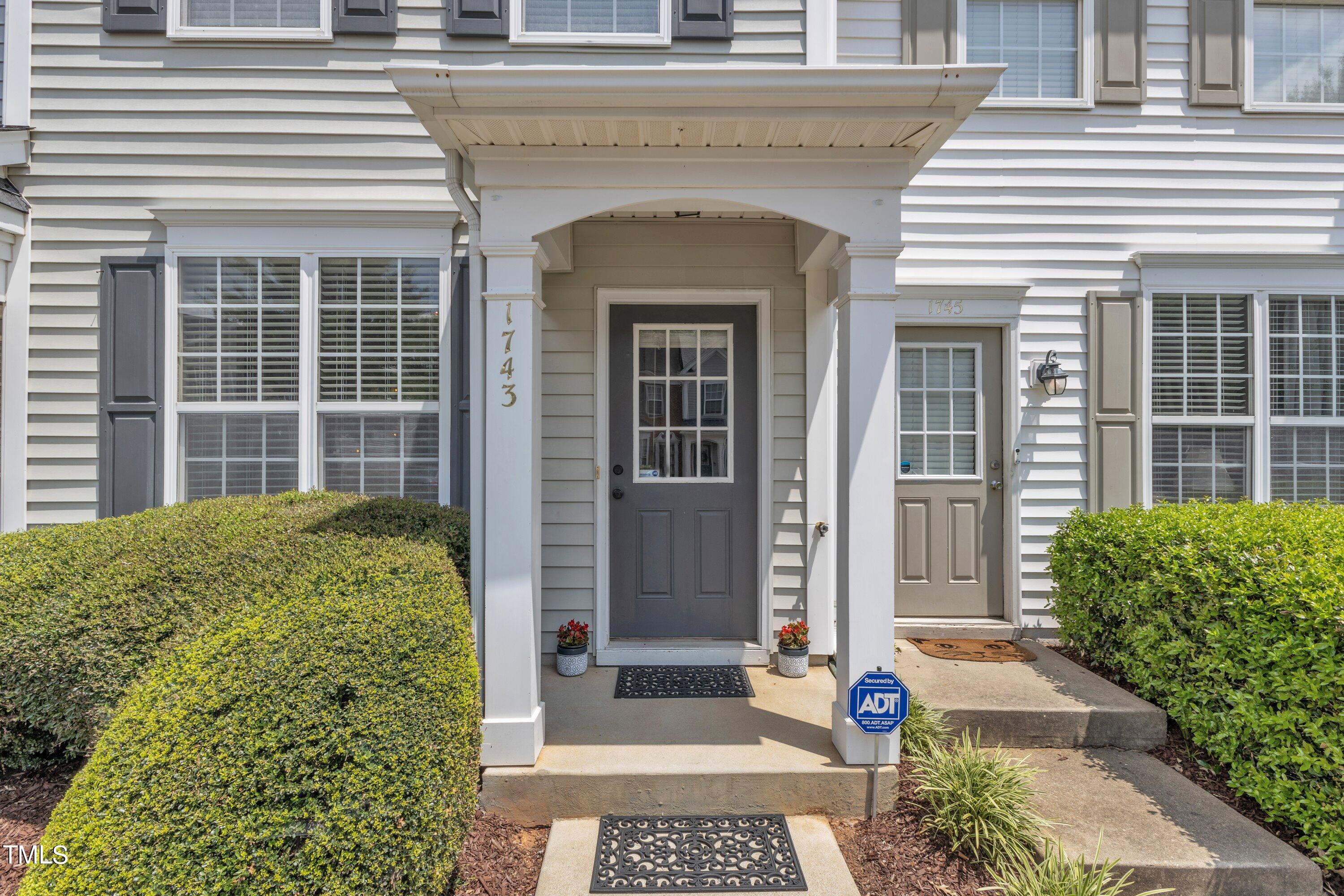 1743 Sorrell Brook Way Raleigh, NC 27609 - Photo 2 of 30 a front view of a house