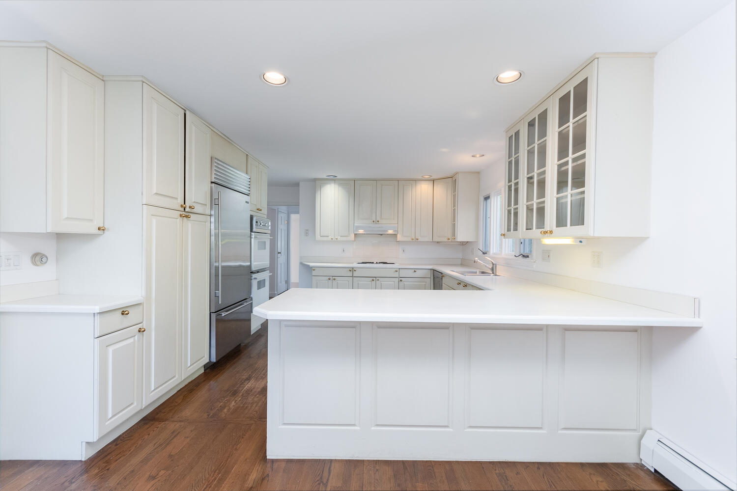 9 Summit Ridge Road New Canaan, CT 06840 - Photo 14 of 35 a view of kitchen with wooden floor