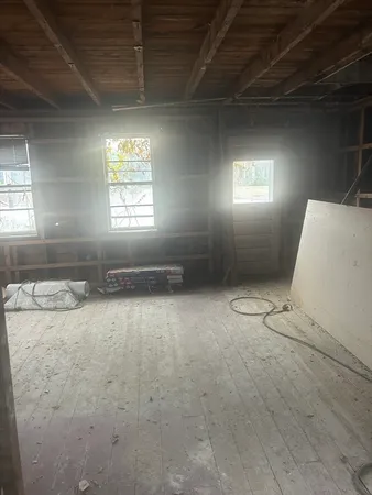an empty room with windows