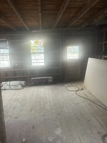 an empty room with windows