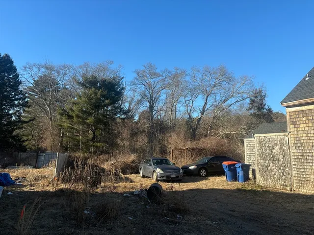 a view of a road with outside of the house