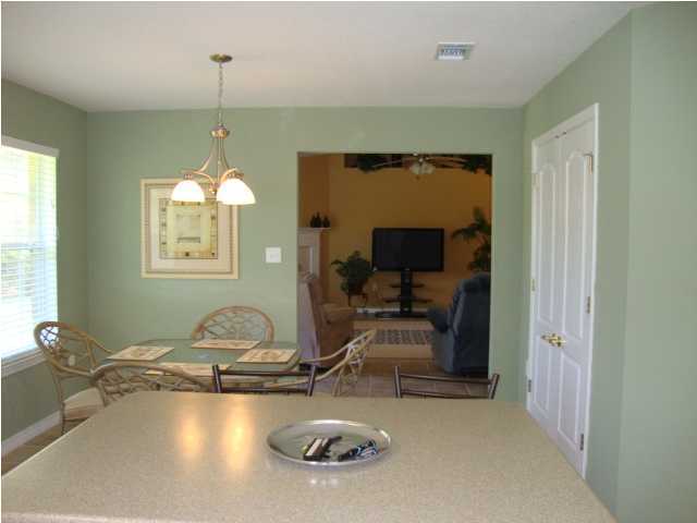 134 East Shipwreck Road Santa Rosa Beach, FL 32459 - Photo 7 of 23 a room with gym equipment and windows
