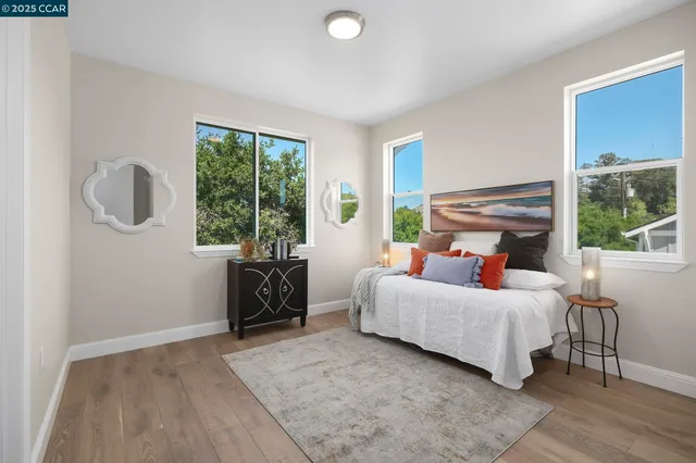 a bed room with a bed and a window