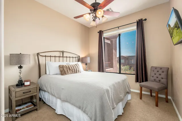 a bathroom with a shower and toilet