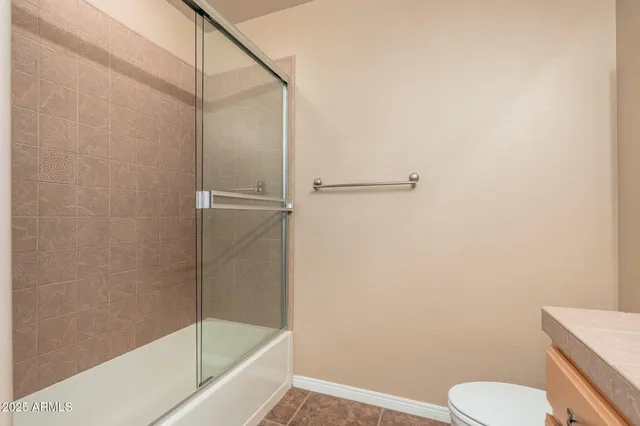 an aerial view of residential houses with outdoor space and view