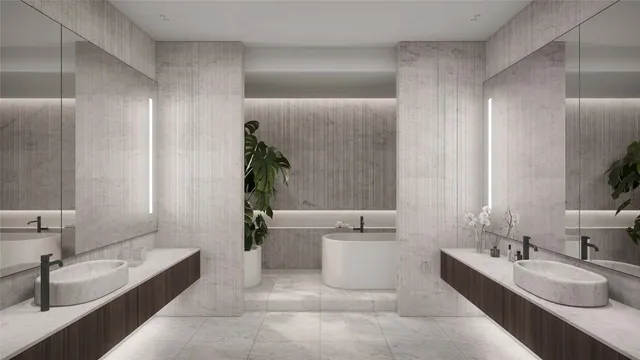 a bathroom with a tub a sink and mirror