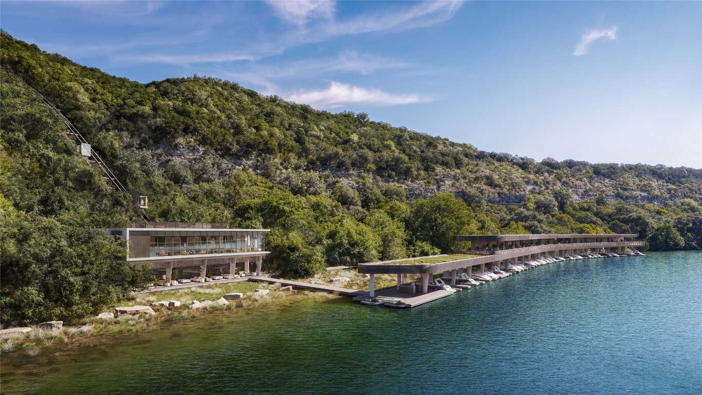 6507 Bridge Point Parkway, Unit VIOLET 4B Austin, TX 78730 - Photo 5 of 19 a view of a lake with a mountain in the background
