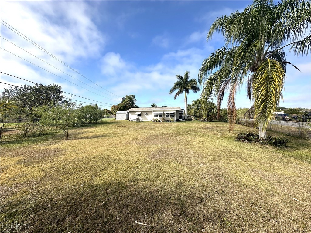 100 Davis Road Lehigh Acres, FL 33936 - Photo 31 of 32 a view of beach and ocean