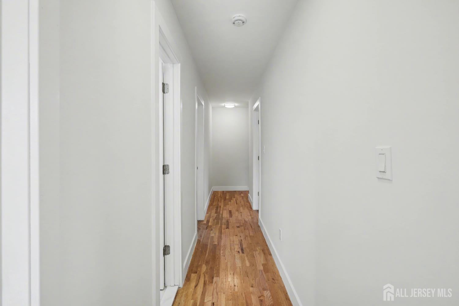 16 Hershey Road East Brunswick, NJ 08816 - Photo 25 of 50 a view of a hallway with a door