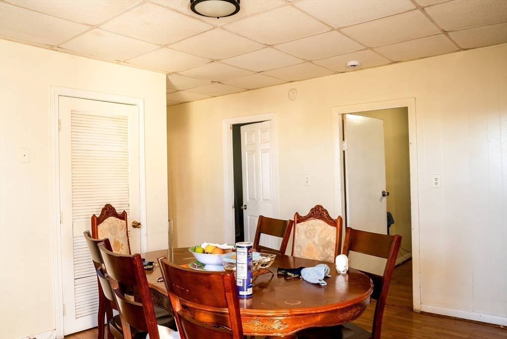 118 Jefferson Street Fall River, MA 02721 - Photo 15 of 34 a view of a dining room with furniture and wooden floor