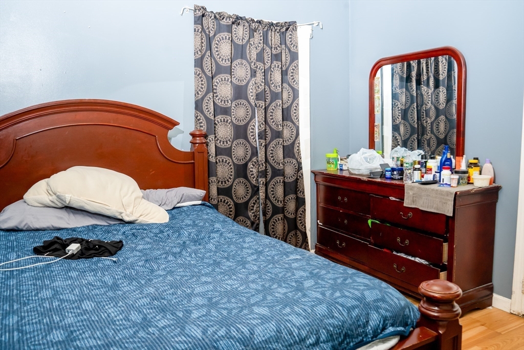 118 Jefferson Street Fall River, MA 02721 - Photo 25 of 34 a bedroom with a bed and a dresser