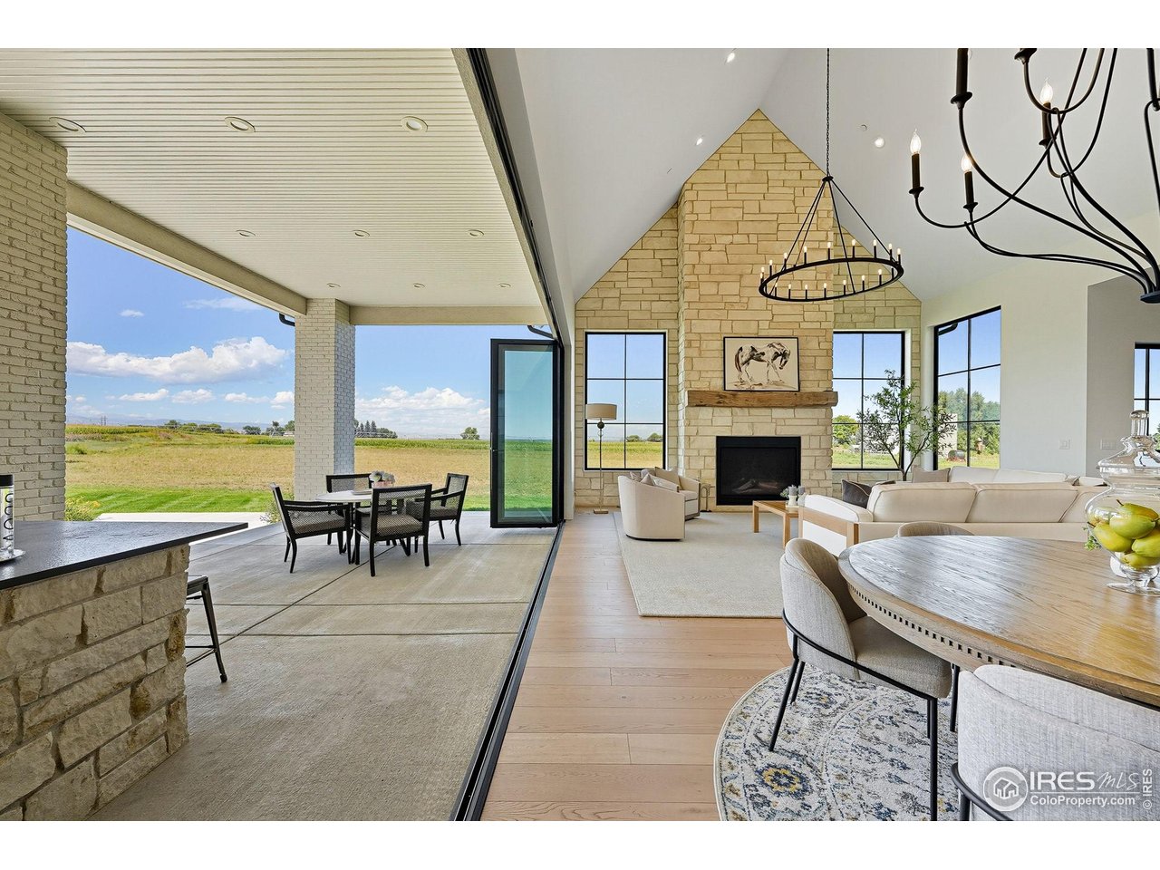 a view of a livingroom with furniture window and wooden floor