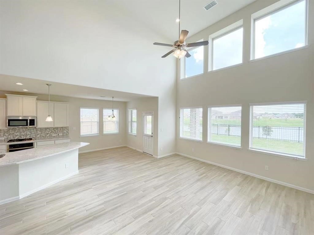 4403 Silvergrass Lane Katy, TX 77493 - Photo 11 of 26 a view of an empty room with a window
