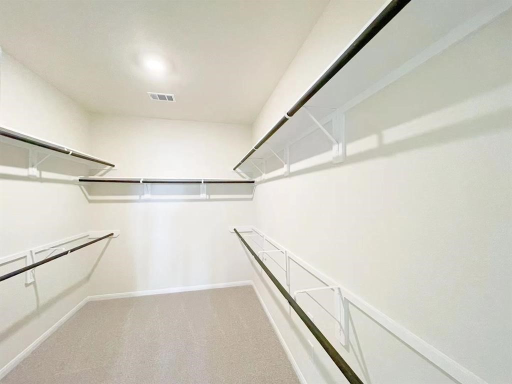 4403 Silvergrass Lane Katy, TX 77493 - Photo 16 of 26 a view of a walk in closet