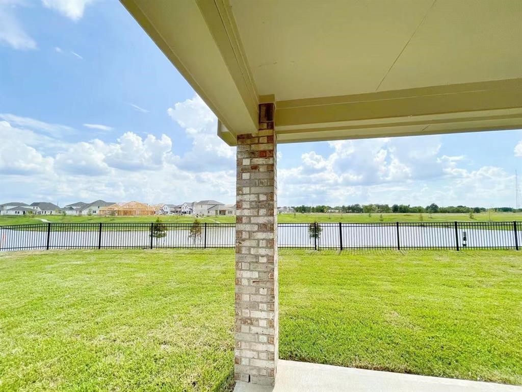 4403 Silvergrass Lane Katy, TX 77493 - Photo 24 of 26 a view of a swimming pool with an ocean view