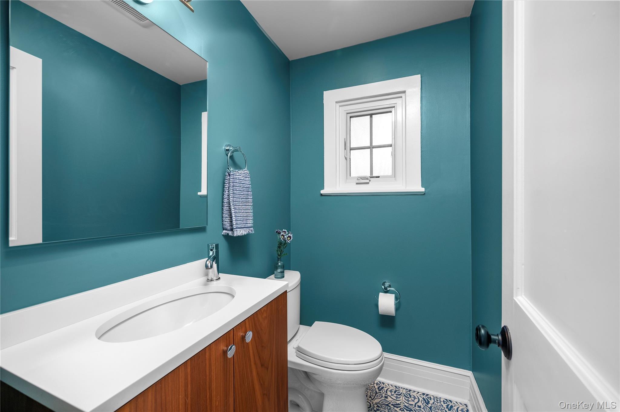 123 Ellison Avenue Bronxville, NY 10708 - Photo 11 of 27 a bathroom with a sink toilet and window