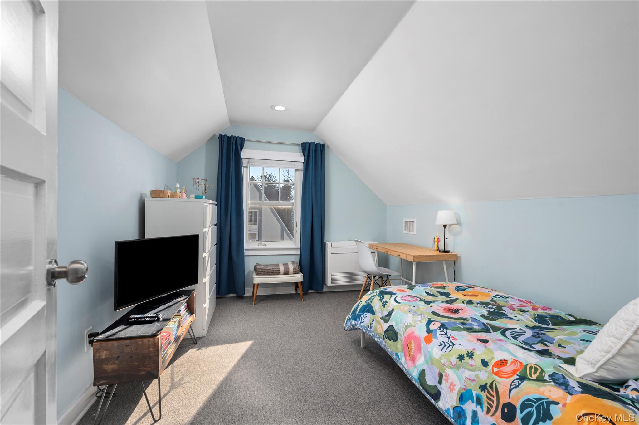 123 Ellison Avenue Bronxville, NY 10708 - Photo 19 of 27 a bedroom with a bed and flat screen tv