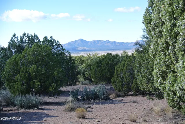 a view of a mountain with a outdoor space