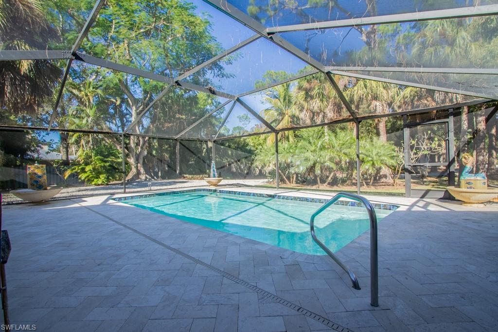 4525 North Road Naples, FL 34104 - Photo 17 of 33 a view of yard with a patio