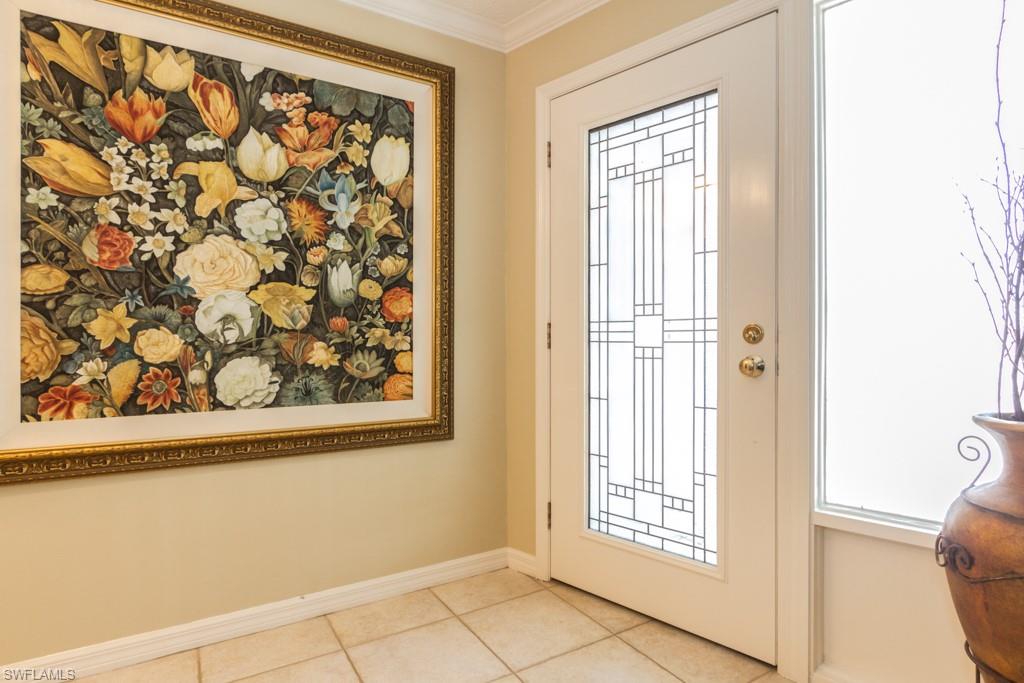 4525 North Road Naples, FL 34104 - Photo 2 of 33 a view of a small space with a window and front door