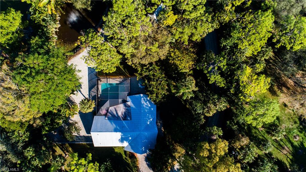 4525 North Road Naples, FL 34104 - Photo 26 of 33 a view of a house in a forest