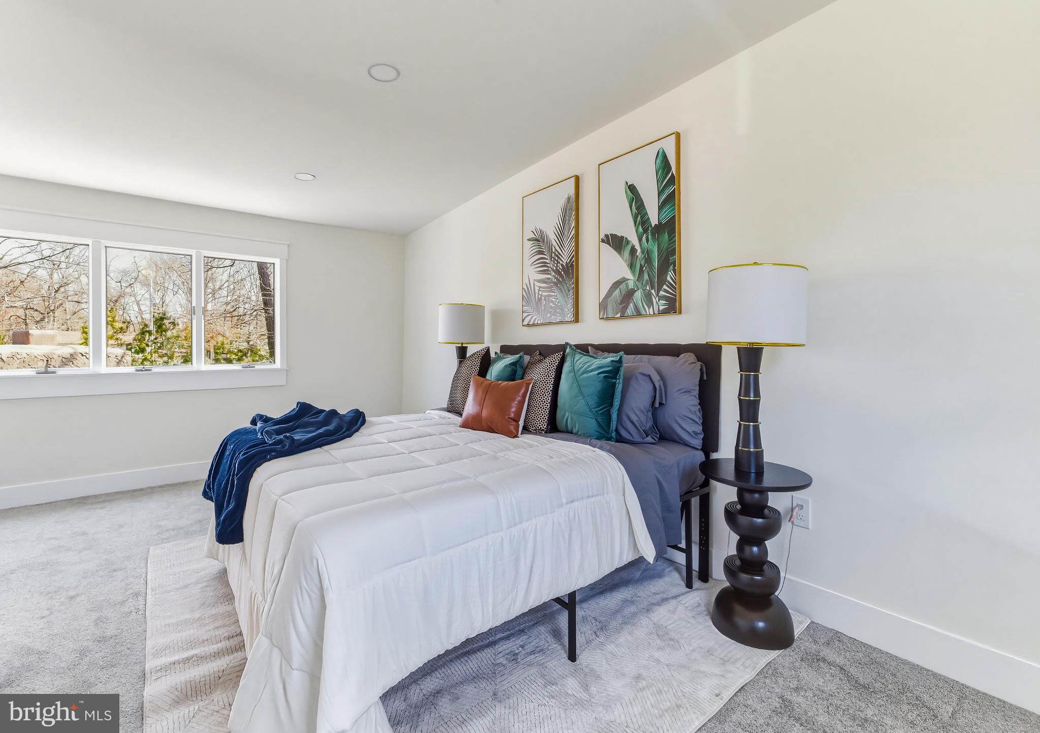 451 Alcyon Boulevard Pitman, NJ 08071 - Photo 16 of 32 a bedroom with a bed and window