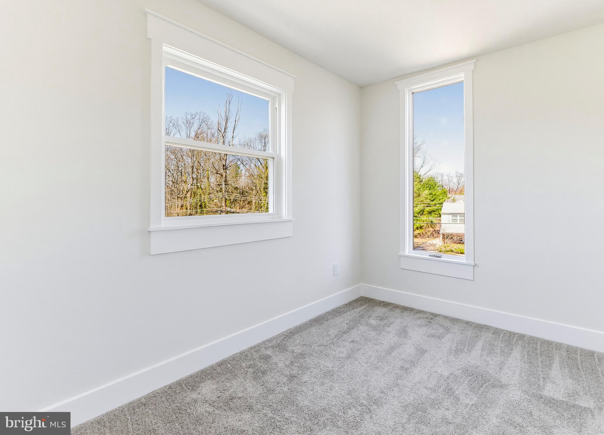 451 Alcyon Boulevard Pitman, NJ 08071 - Photo 19 of 32 an empty room with windows