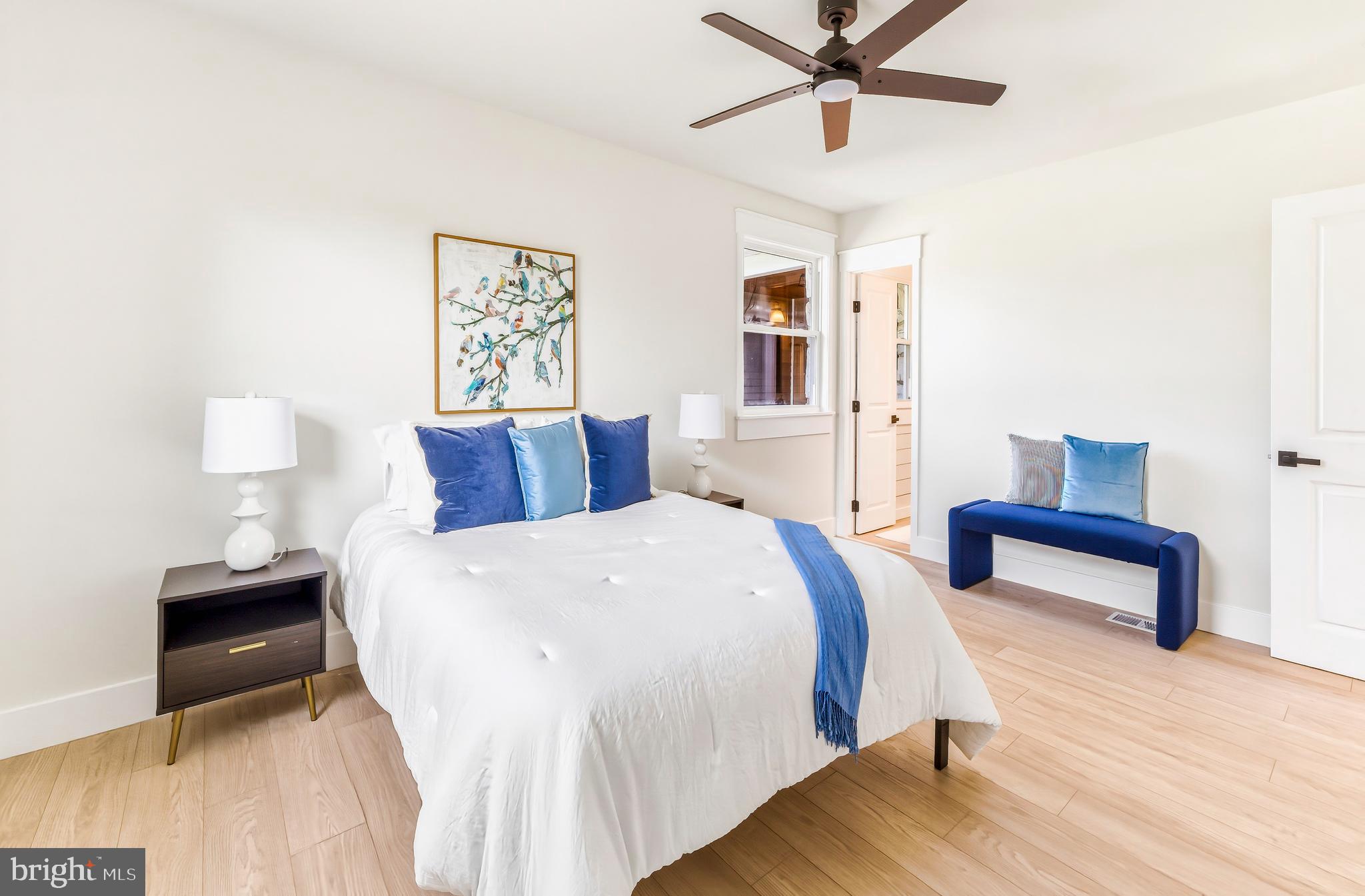451 Alcyon Boulevard Pitman, NJ 08071 - Photo 22 of 32 a spacious bedroom with a bed and window