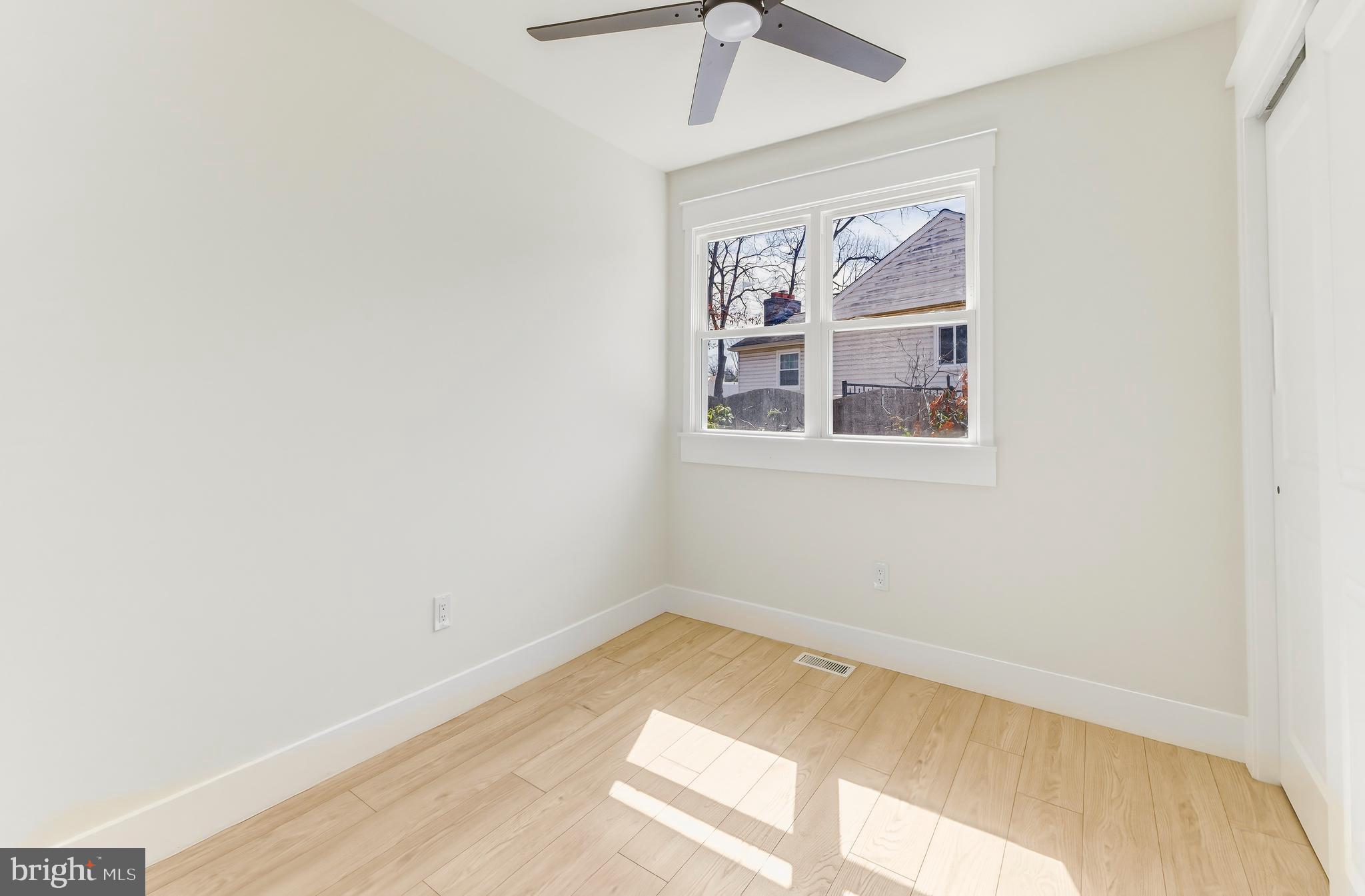 451 Alcyon Boulevard Pitman, NJ 08071 - Photo 24 of 32 a view of empty room with windows