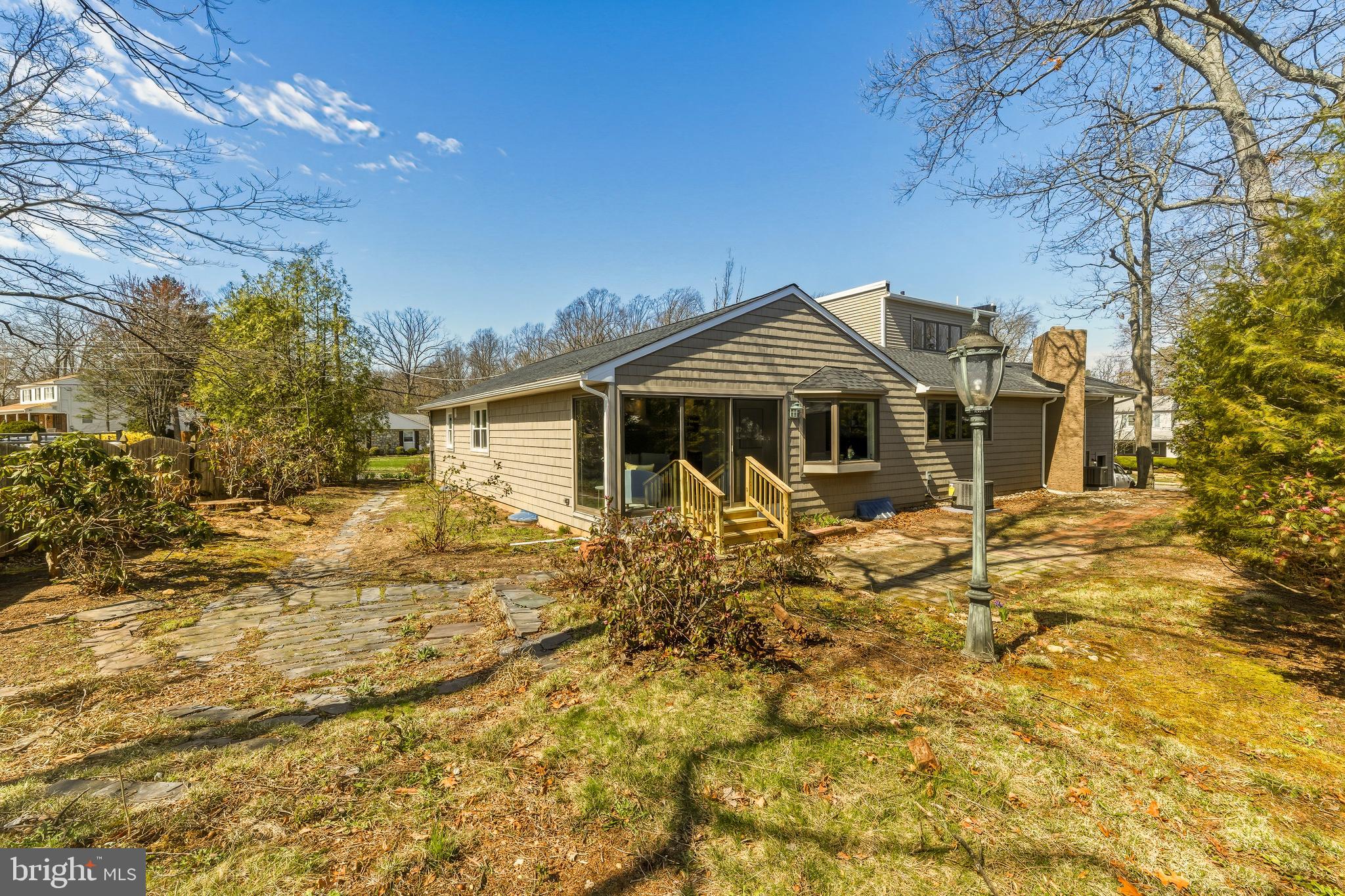 451 Alcyon Boulevard Pitman, NJ 08071 - Photo 30 of 32 a front view of a house with a garden