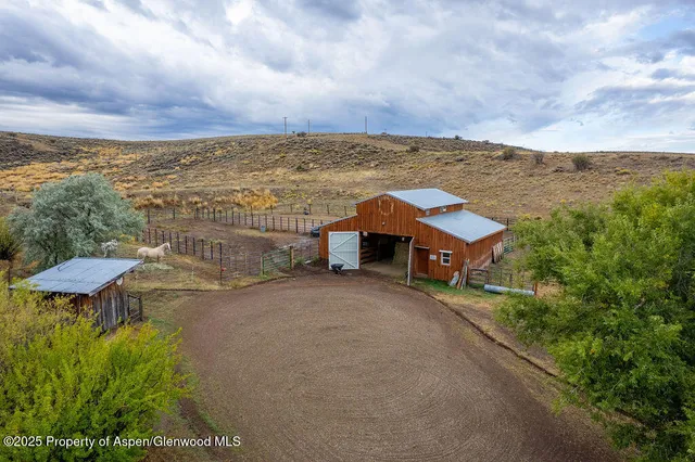 a view of an ocean beach and mountain