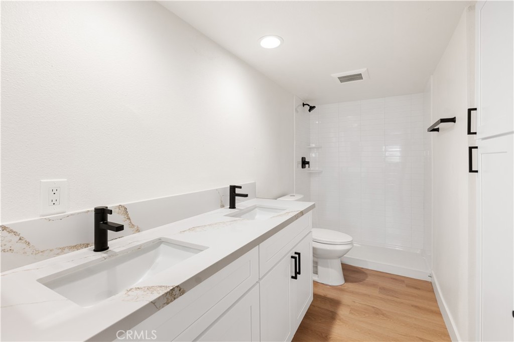 82151 Waring Way Indio, CA 92201 - Photo 15 of 22 a bathroom with a sink and a toilet