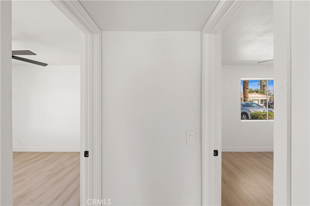 82151 Waring Way Indio, CA 92201 - Photo 16 of 22 a view of a hallway