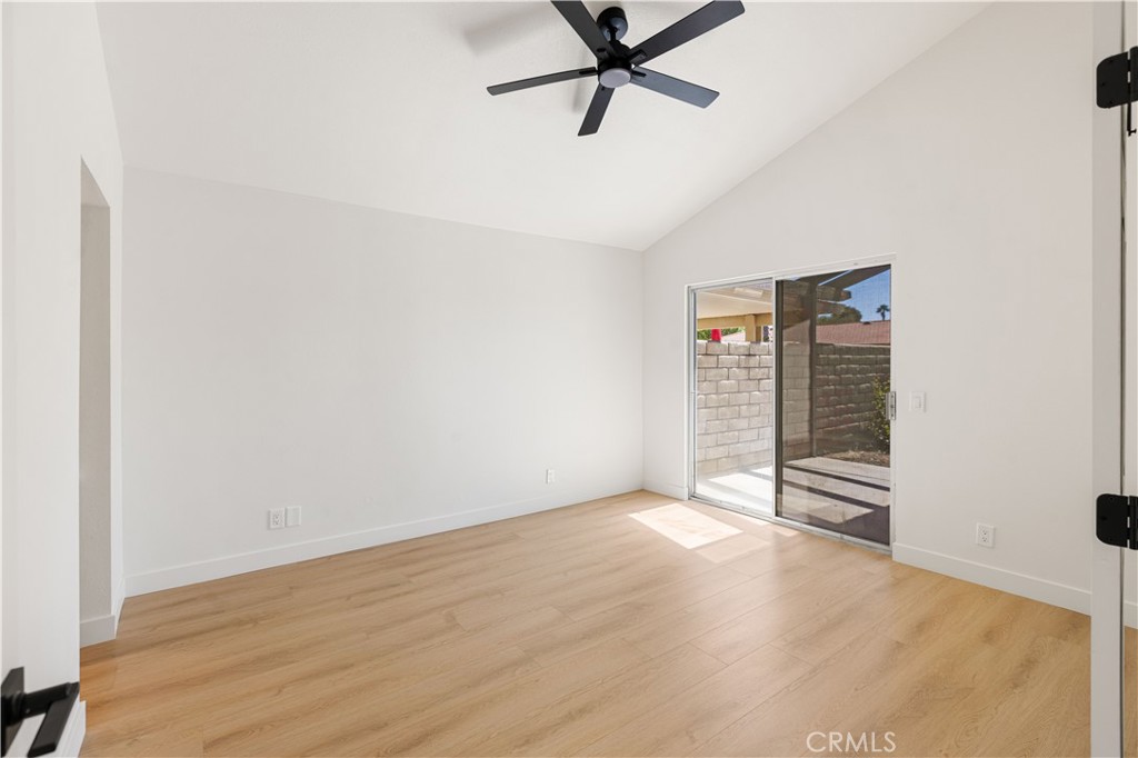 82151 Waring Way Indio, CA 92201 - Photo 6 of 22 a view of a room with wooden floor and white walls