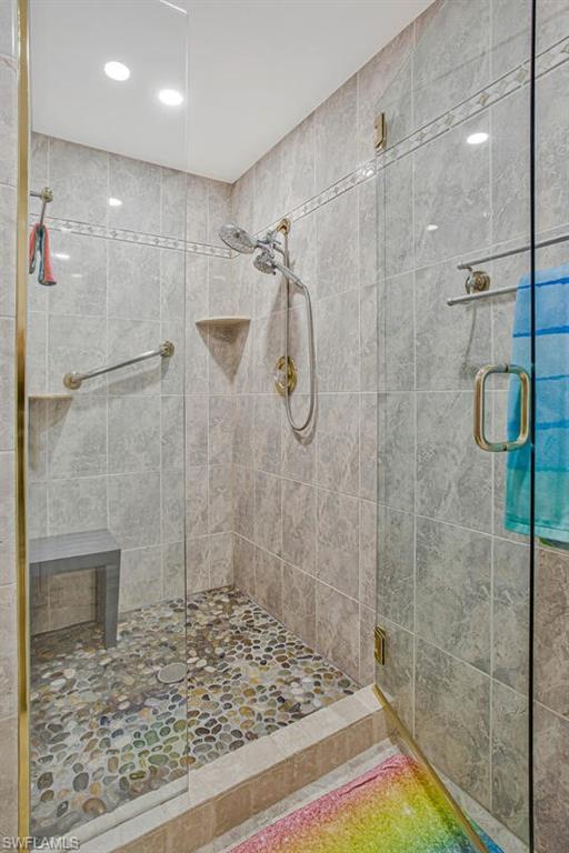 4031 Gulf Shore Boulevard North, Unit 6B Naples, FL 34103 - Photo 15 of 37 Bathroom featuring a stall shower