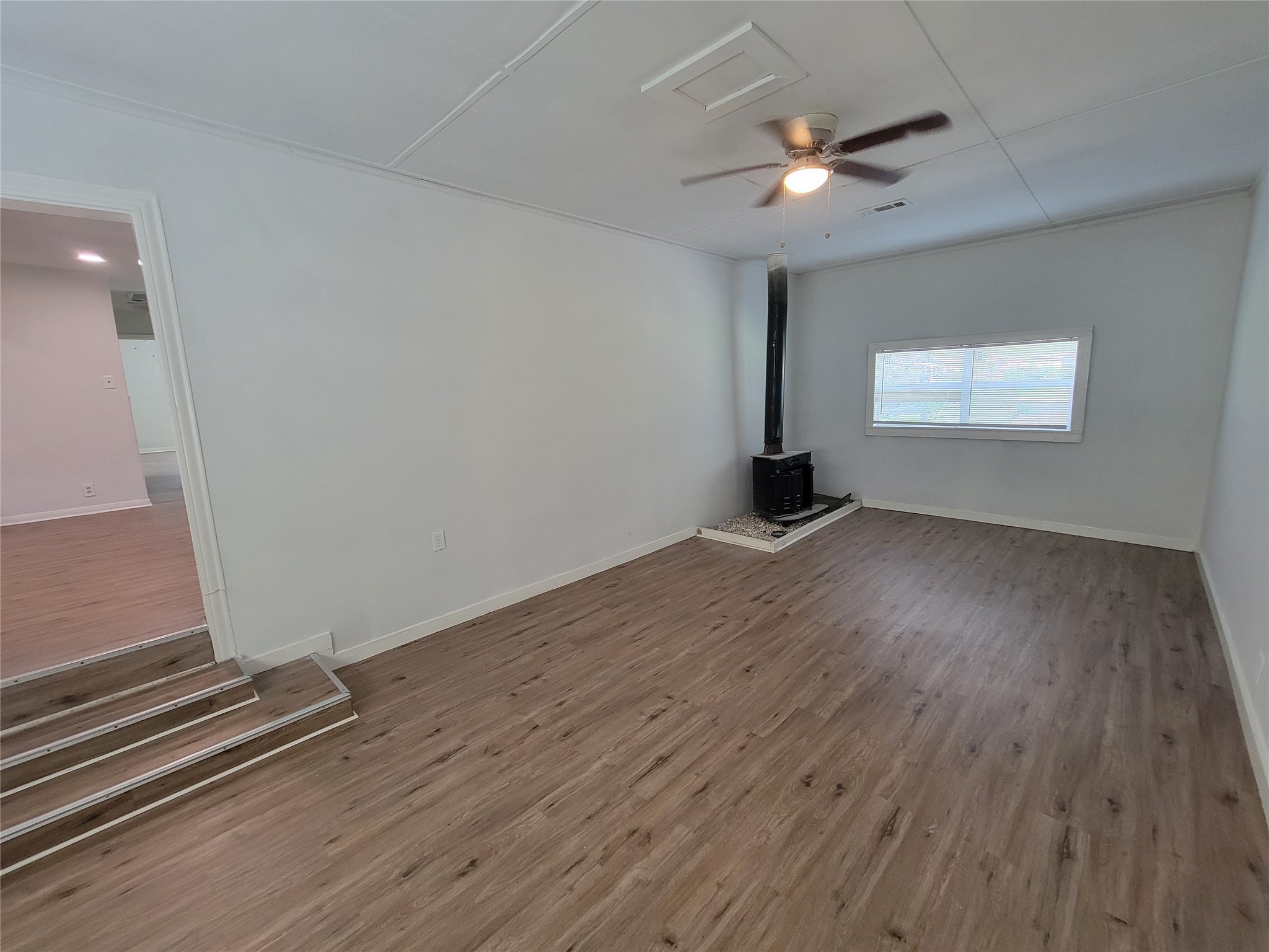 830 Becker Street Channelview, TX 77530 - Photo 10 of 19 Den with wood stove