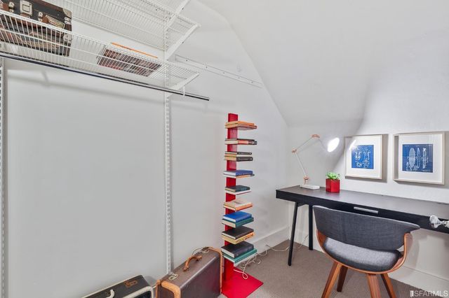 a room with stairs and wooden floor