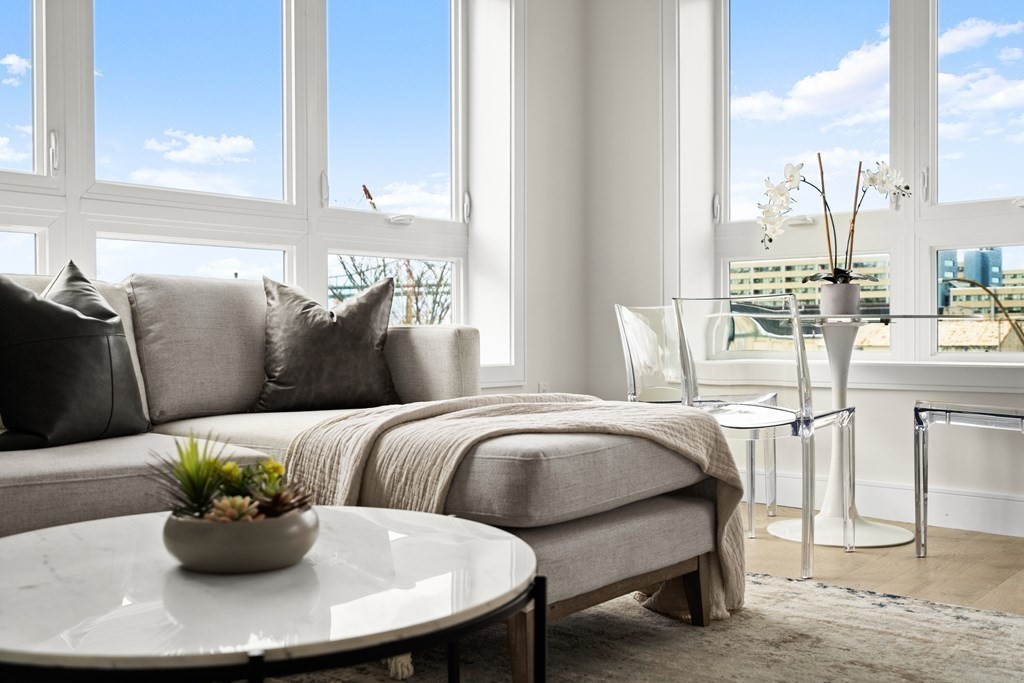 301 Border Street, Unit 311 Boston, MA 02128 - Photo 12 of 33 a living room with furniture flowerpot and window
